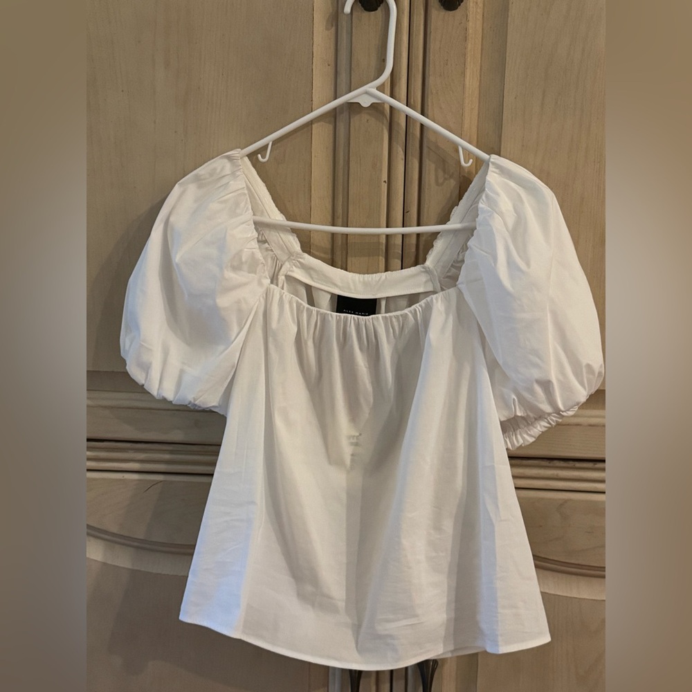 White puffed sleeve blouse